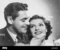 THE GAME THAT KILLS, from left: Charles Quigley, Rita Hayworth, 1937 Stock  Photo