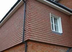 Lopo terracotta exterior wall tile cladding. Plain Clay Tiles For Vertical Tiling Tile Cladding House Front Exterior Design