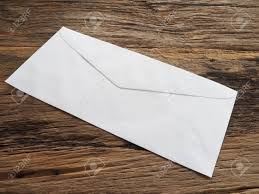 A resignation letter is an official letterbusiness letter formata business letter. White Envelope On Old Table In The Business Concept Meaning Resignation Or Leave Stock Photo Picture And Royalty Free Image Image 104427048