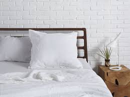 A good strategy is have euro pillows with shams matching the duvet cover used. Linen Euro Sham Parachute