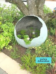 Kugel Aus Beton Mit Teich Fur Den Garten Beton Garten Kugel Teich Garten Design Garten Garten Beton