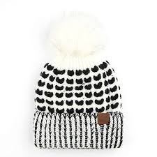 Knit hats require very little yarn, making them quick and thrifty holiday gifts. Heart Knit Cc Beanie Hat With Pom