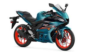 Enter the new yamaha xmax 250, a light and agile automatic bike that feels comfortable both in the city and on the open roads. 2021 Yamaha Yzf R3 In New Teal And Motogp Livery Paultan Org