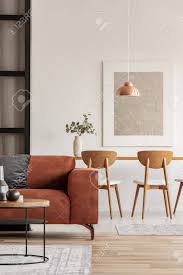 Settee dining dining room bench pedestal dining table bay window curtains white curtains curtains with grey walls bay window decor blinds curtains rideaux du bow window. Open Plan Living And Dining Room Interior With Long Table With Chair And Brown Velvet Settee Stock Photo Picture And Royalty Free Image Image 116649092