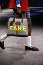 Get free shipping on women's and men's apparel, accessories, shoes & more. Gucci On Twitter A Gg Motif Suitcase Is Printed With The Words Not And Fake On Either Side Of A Leather Trimmed Gg Motif Suitcase Designed By Alessandromichele For The Men S Guccifw20