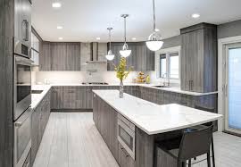With gray kitchen cabinet ideas, you have a choice between painted cabinets, which are covered in an opaque gray hue, or stained cabinets, which have a translucent finish that allows some wood grain to show through. Wood Grey Modern Kitchen Cabinets Novocom Top