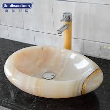 Our range of designer bathroom tops is made to order and is personalized finished. Polished Natural White Onyx Marble Stone Art Bathroom Sink Buy White Onyx Marble Stone Art Bathroom Sink Cheap Bathroom Sinks Marble Bathroom Trough Sink Product On Alibaba Com