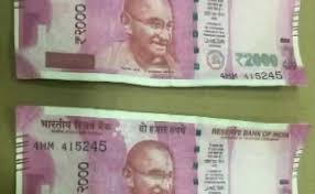 How do you make fake money? How To Make Fake Rs 2 000 Notes Bengaluru Men Used A Copier And Glitter Pen