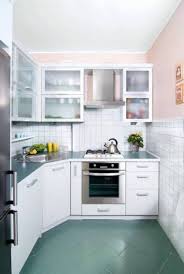 In a small room, tiles can make a serious design impact (and because you have less square footage, the price is far more approachable). Design Of A Small Kitchen Design Ideas On 45 Photos Make Simple Design