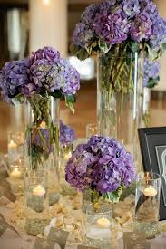 Purple Wedding Centerpiece Featured Photographer Kristyn Hogan Via Elizabeth Ann Flower Centerpieces Wedding Purple Wedding Centerpieces Purple Centerpieces