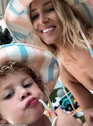 Phoebe Burgess shares tender moment with daughter Poppy