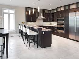 Kitchen Raised Peninsula Overhang With A Different Counter Top Material Dark Kitchen Cabinets Contemporary Kitchen Brown Kitchen Cabinets