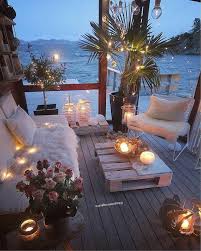 My Idea Of A Perfect Chill Out Space Cosy Seats Fairy Lights Candles Right Next To The Sea I D Spend Mos Backyard Decor Balcony Decor Outdoor Living