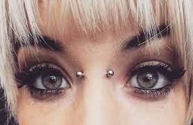 Wildfire Piercing On Instagram An Almost Healed Bridge For Our Penny R00 Piercings Piercingstudio Fa Face Piercings Piercings Nose Bridge Piercing