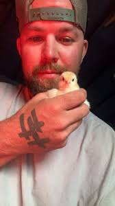 First pic is Miracle, the baby I helped hatch, second is the one I have a  question about.