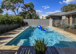 A Compass Pools 10m X Trainer In Quartz From The Bi Luminite Range Pool Houses Pool Colors Small Space Interior Design