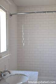 White subway tile bathroom with black border and interesting window tile detailing. Pin On Rub A Dub Dub In The Bathroom