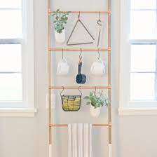 Hangers and racks can be boring at times. Five Ways To Style A Blanket Ladder Style Dwell