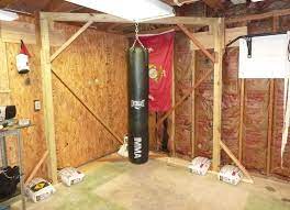 Heavy Bag Stand Without Worrying About Punching Away At Your Support Walls With Every Hit Home Gym Garage Home Gym Design Punching Bag Stand