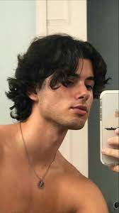 Pin By Luis Antonio On Boys In 2021 Middle Part Curly Hair Middle Part Hairstyles Curly Hair Men