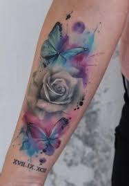 Color flower and butterfly tattoo on left back shoulder. 60 Creative Watercolor Rose Tattoo Designs