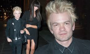 Sum 41's Deryck Whibley walks with fiancée Ariana Cooper a year after  hospitalization