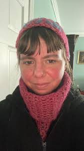 A pocket shawl I crocheted with a matching headband (they're the same color  but lighting makes them look so different).