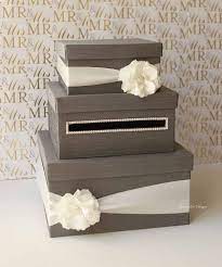 Head on a nature walk to gather twigs, leaves, moss, and pinecones needed for this project and get to crafting. This Looks Like A Wedding Cake Card Box Wedding Wedding Cards Wedding Card Holder