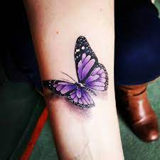 25 Breathtaking Butterfly Tattoos That Go Way Beyond Basic Purple Butterfly Tattoo Butterfly Tattoos For Women Butterfly Tattoo Designs