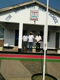 Ms tom mboya's brother standing with book of condolences. Tom Mboya Boy S High School Leavers Posts Facebook