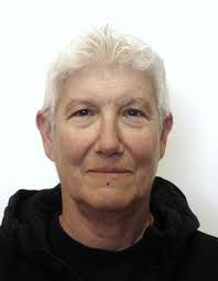 Driving licence query. I have done the exchange but my photos keep getting  rejected because my hair is too light against the background. They have  asked for another photo, "with the background