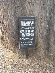 This House Is Protected By Smith Wesson Staked Sign Smith Wesson Smith House