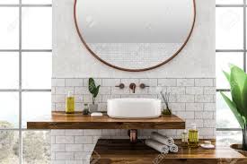 white round bathroom sink standing on