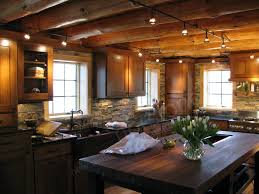 The obvious thing that you can conclude just by looking the pictures is that the rustic style features a high usage of wood mostly, as well as other materials which give it an. Rock Panels On A Rustic Kitchen Backsplash