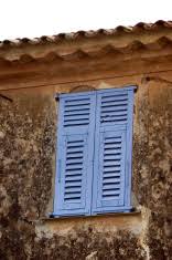 The modern building on the left gives a perfect pop of color around. Blue Shutters Window Provence France Stock Photos Freeimages Com