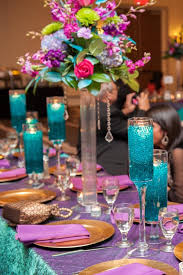 Gorgeous Purple And Teal Wedding Reception Decor Desi Wedding Indian Wedding Reception Hyatt Regency Wichit Mesas De Boda Decoracion Bodas Colores Para Boda