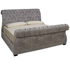 Three slat support system with adjustable center supports. Jonathan Louis Malena Jonathan Louis Malena King Upholstered Sleigh Bed Jordan S Furniture Upholstered Sleigh Bed Contemporary Style Beds Sleigh Beds