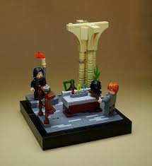 Once it finishes cleaning, it will spit out the last ingredient. 27 Amazing Lego Vignettes Bring Harry Potter To Life The Brothers Brick Lego Harry Potter Moc Lego Hogwarts Harry Potter Lego Sets