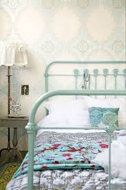 The strong and sturdy wrought iron can never go out of fashion. Another Awesome Vintage Metal Bed Frame And The Wallpaper Wow Bedroom Turquoise Iron Bed Blue Bedding
