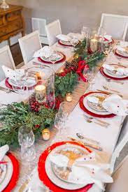 You won't believe what a difference a fir branch and holiday ribbon can make. Elegant Christmas Tablescape Setting The Perfect Christmas Table Christmas Table Centerpieces Christmas Table Christmas Table Settings
