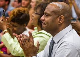 Eddie Bolden, once wrongly imprisoned, watches son graduate college