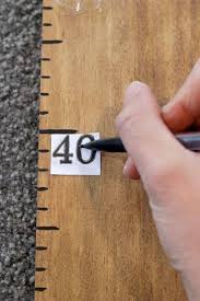 With numbers in place, draw out your tree design. Diy Ruler Growth Chart The Kiwi Country Girl
