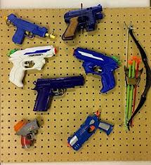 Here is a real simple diy nerf gun storage rack system for under $$20.00 bucks. Nerf Toy Gun Hanging Kit Pegboard Fixings And Hanging Pegs 800x400mm Amazon Co Uk Diy Tools