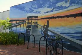 Get directions, reviews and information for painting with flowers in port washington, ny. Murals Bring Life To Main Street Buildings Great Neck News The Island Now
