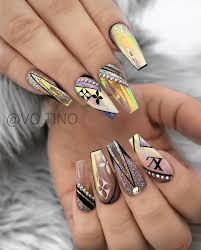 Forget a classic french mani and go for glitter tips instead. Dope Nails