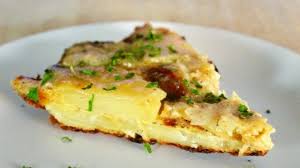 This Classic Potato And Onion Omelet Is Eaten All Over Spain This Version Includes Roasted Red Peppers An Tortilla Espanola Recipes Breakfast Quiche Recipes