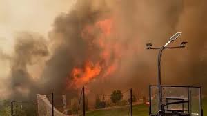 Watch wildfire race toward homes