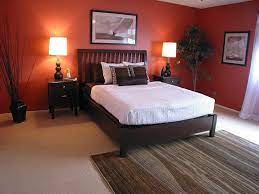 You Will Smile Until You Realize You Had To Sell Or Stage A House Just Like This Orange Bedroom Walls Living Room Orange Bedroom Orange