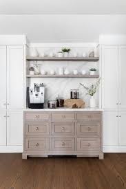 This wall is floor to ceiling storage cabinets that are either closed or translucent. Floor To Ceiling Kitchen Cabinets Design Ideas