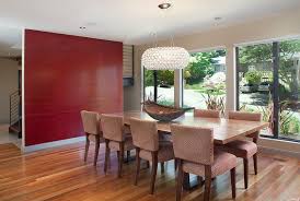 This red dining room is an eclectic selection of favourite pieces, pitched together in a riot. How To Create A Sensational Dining Room With Red Panache